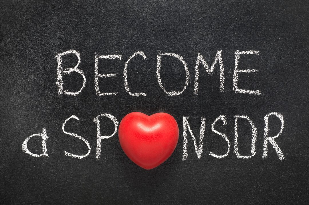 Chalkboard with "Become Sponsor" message and a red heart symbol.